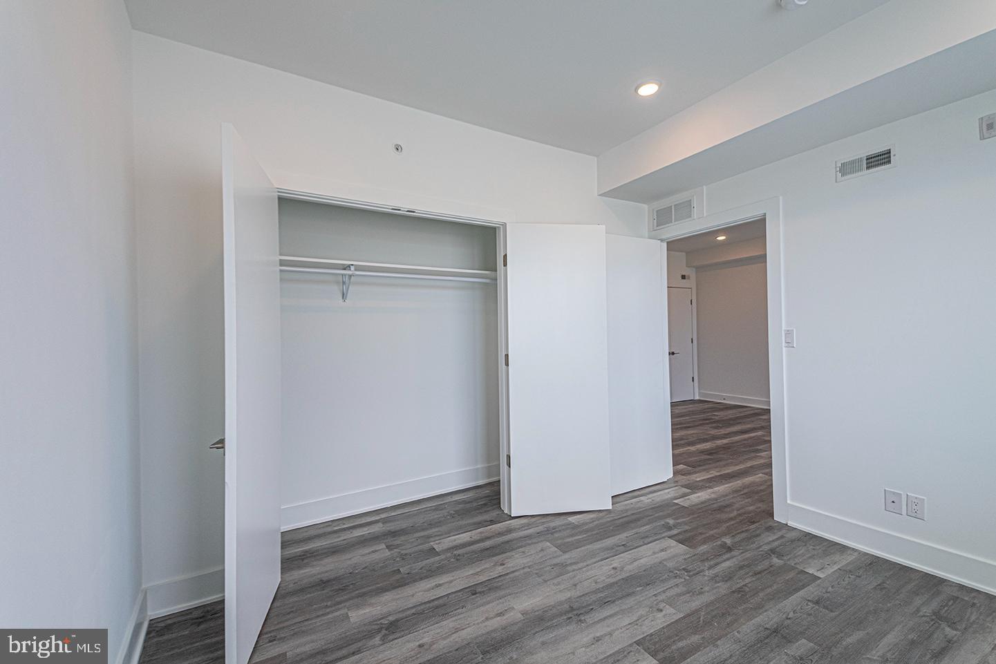 1245 Ridge Avenue, Unit 309 Philadelphia, PA 19123 - Photo 15 of 21 a view of wooden floor in an empty room