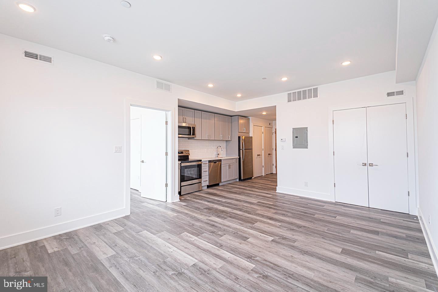 1245 Ridge Avenue, Unit 309 Philadelphia, PA 19123 - Photo 10 of 21 a view of empty room with wooden floor