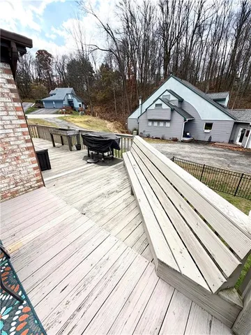 a view of a swimming pool with a yard