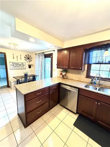 a kitchen with a cabinets and sink