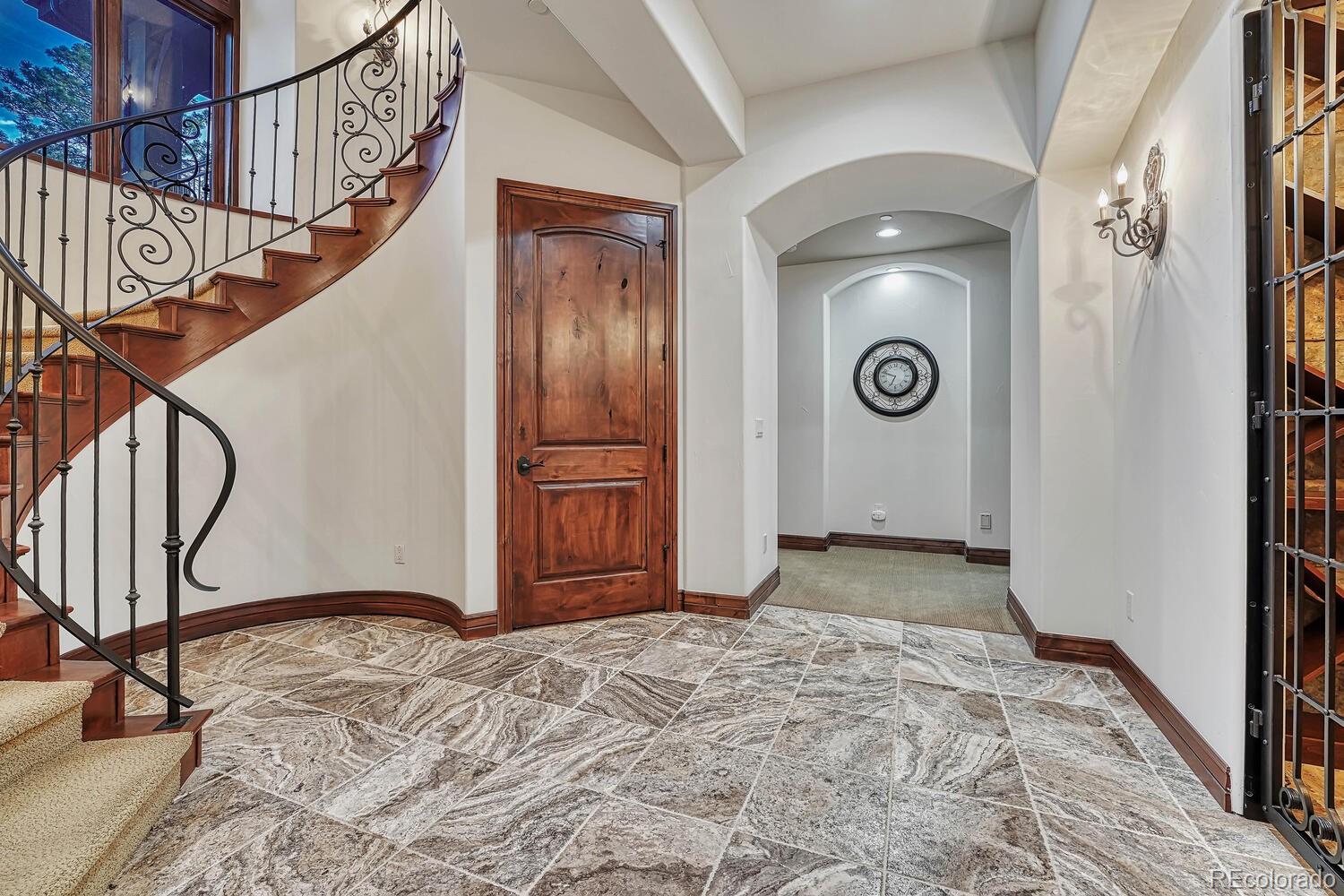 7959 Forest Keep Circle Parker, CO 80134 - Photo 25 of 40 a view of an entryway with wooden floor