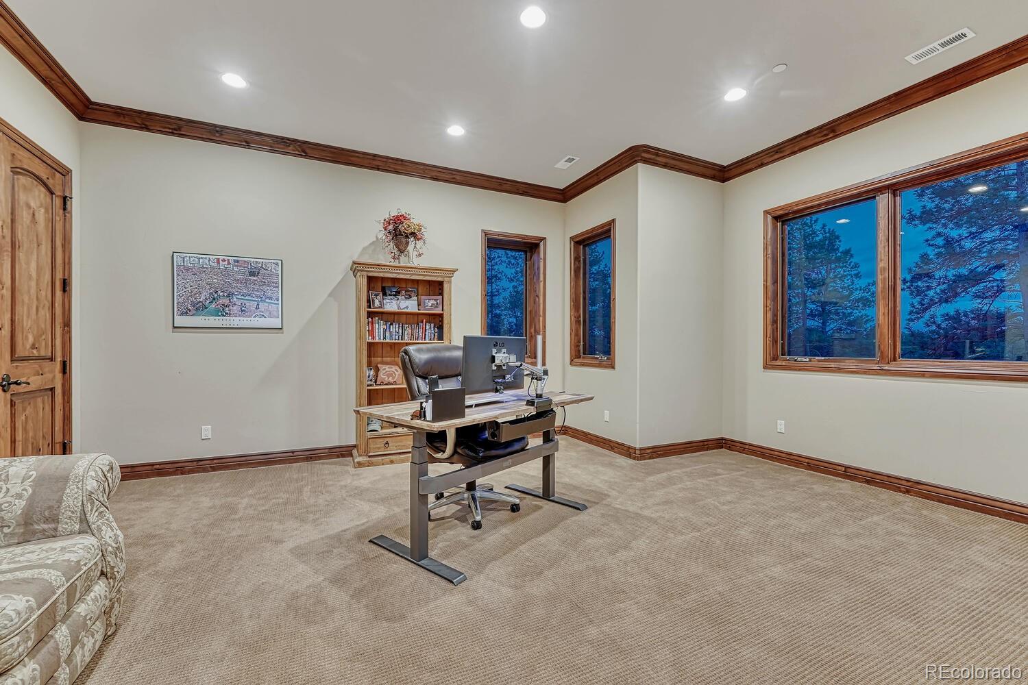 7959 Forest Keep Circle Parker, CO 80134 - Photo 29 of 40 a view of a livingroom with workspace and a window