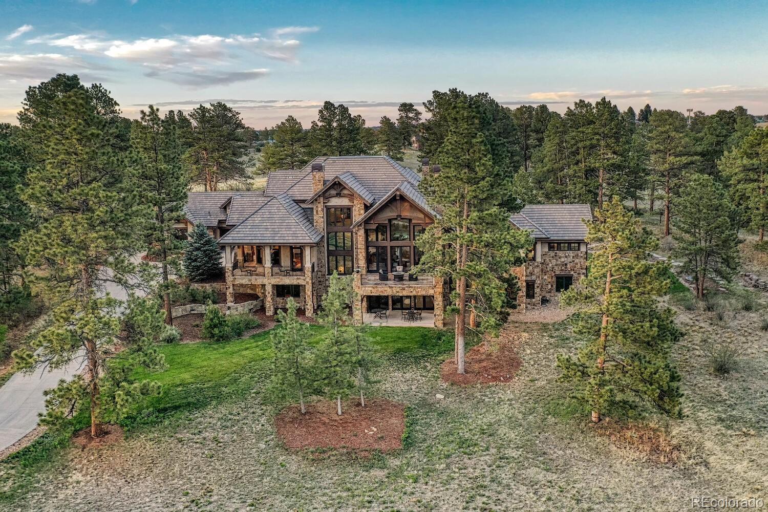 7959 Forest Keep Circle Parker, CO 80134 - Photo 35 of 40 a view of a house with a big yard plants and large trees