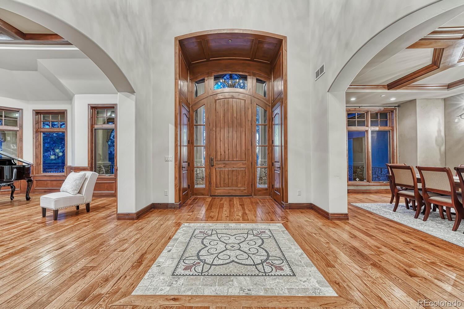 7959 Forest Keep Circle Parker, CO 80134 - Photo 5 of 40 a living room with furniture and a wooden floor