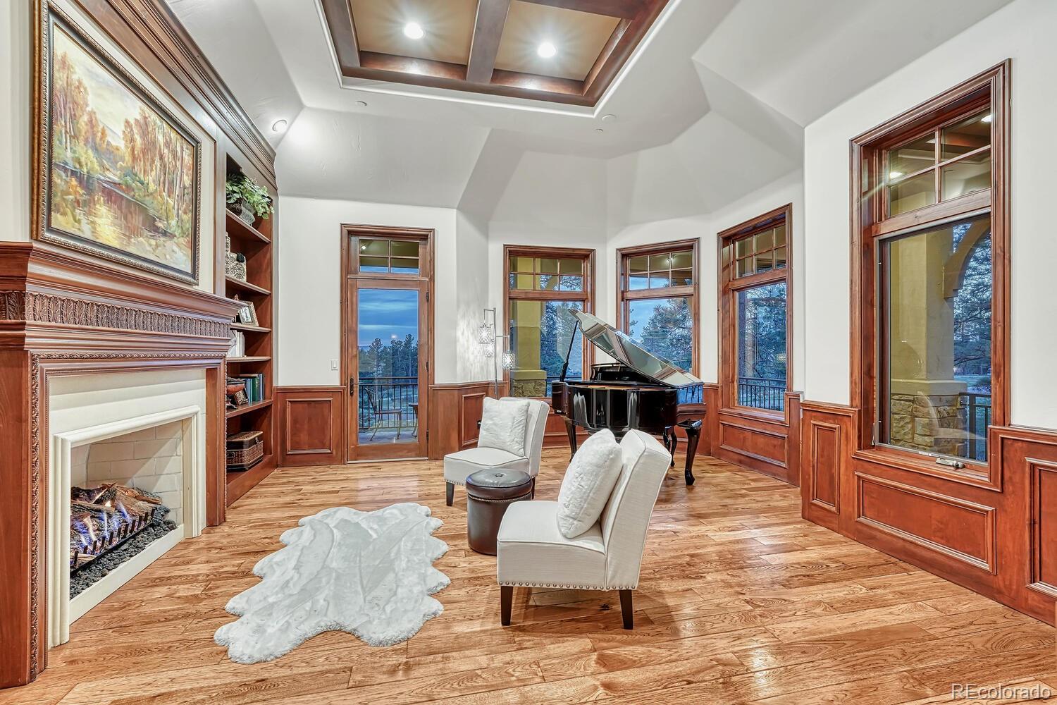 7959 Forest Keep Circle Parker, CO 80134 - Photo 8 of 40 a living room with furniture and large windows