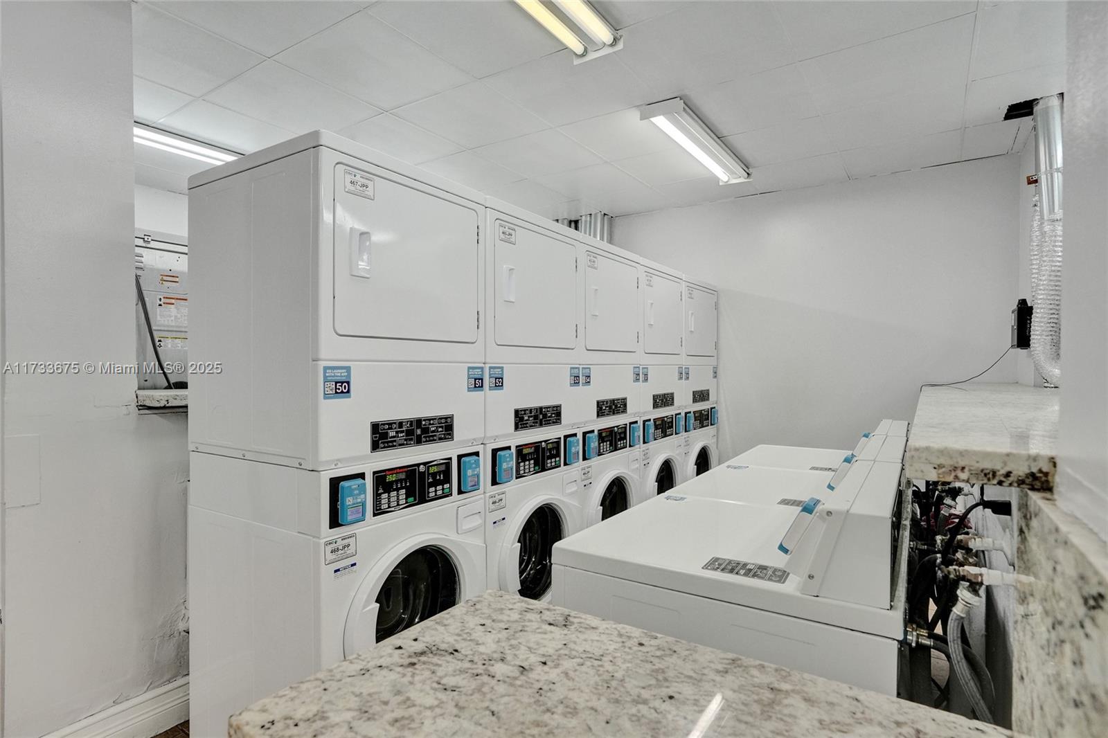 850 North Miami Avenue, Unit W1810 Miami, FL 33136 - Photo 24 of 31 a view of living room with furniture and white walls