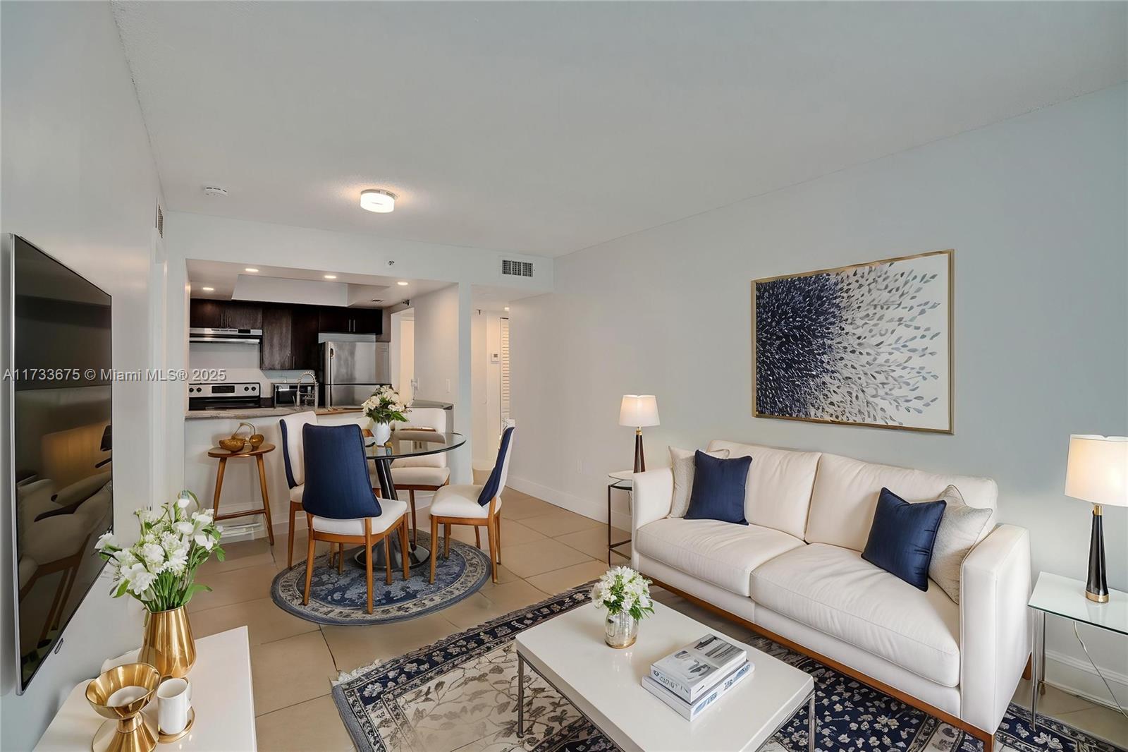 850 North Miami Avenue, Unit W1810 Miami, FL 33136 - Photo 3 of 31 a living room with furniture and kitchen view