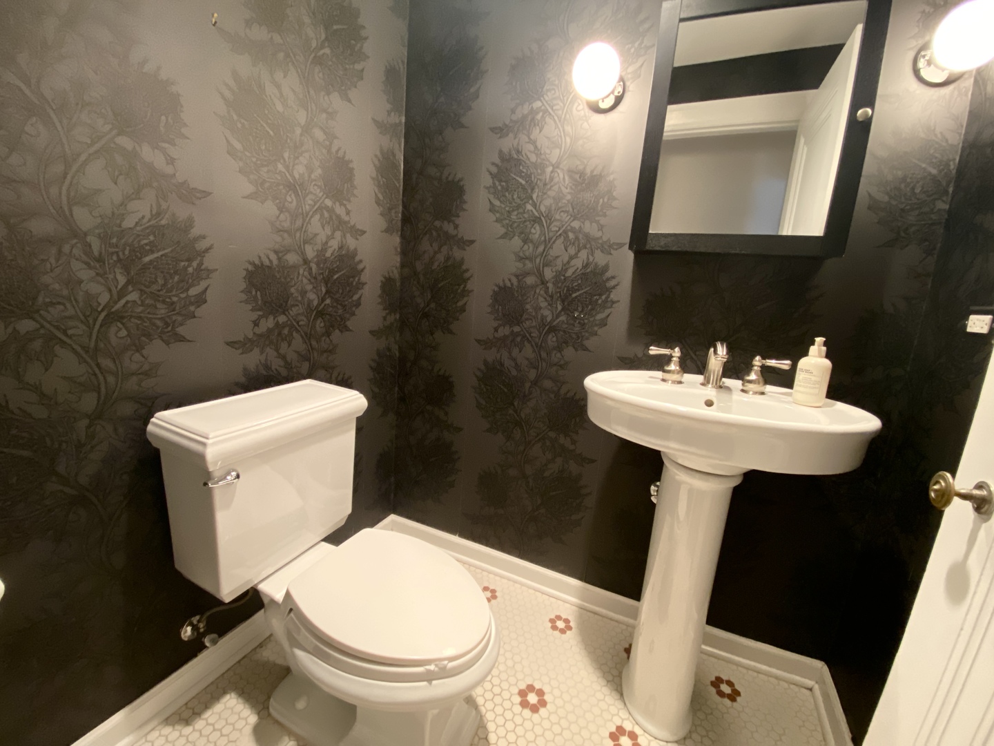 240 Lee Street, Unit 3 Evanston, IL 60202 - Photo 17 of 23 a bathroom with a sink toilet and mirror