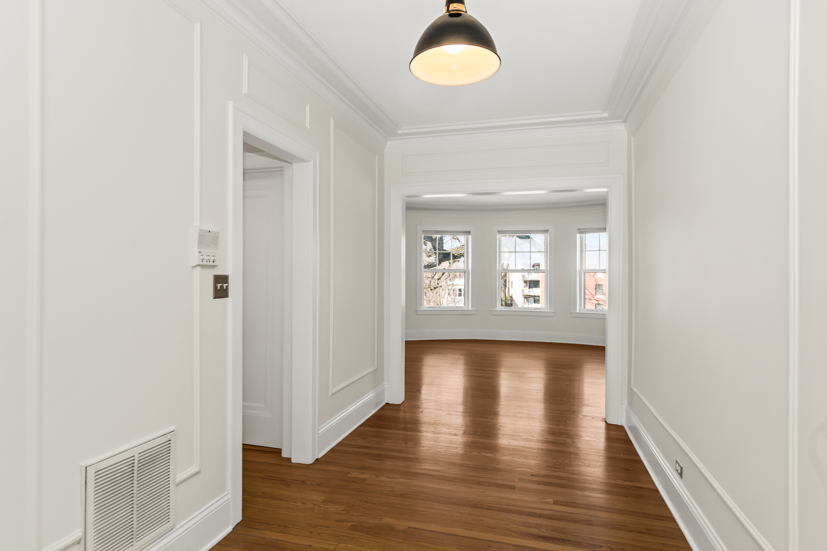 240 Lee Street, Unit 3 Evanston, IL 60202 - Photo 2 of 23 a view of hallway with wooden floor