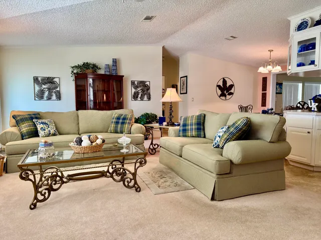 a living room with furniture and a couch