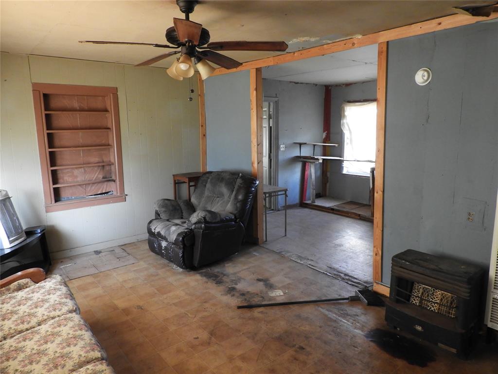 208 Reeves Street Winters, TX 79567 - Photo 13 of 14 a living room with furniture and a window