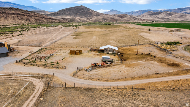 544 East 600 North, Unit 1 Joseph, UT 84739 - Photo 62 of 65 Sprawling rural property featuring open land, a large barn, and surrounding mountainous terrain