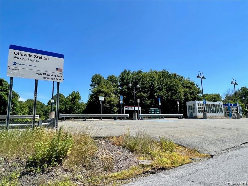22 Kelly Hill Road, Unit 3 Otisville, NY 10963 - Photo 16 of 16 a view of a swimming pool with an outdoor seating and a yard