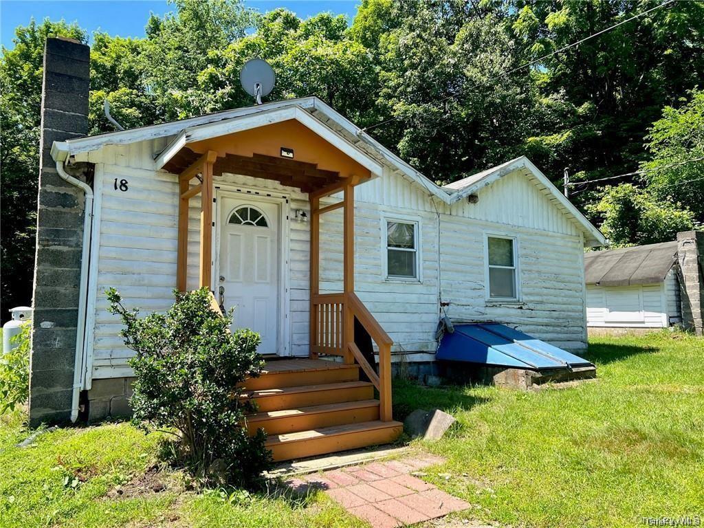 22 Kelly Hill Road, Unit 3 Otisville, NY 10963 - Photo 2 of 16 a front view of house with yard and green space