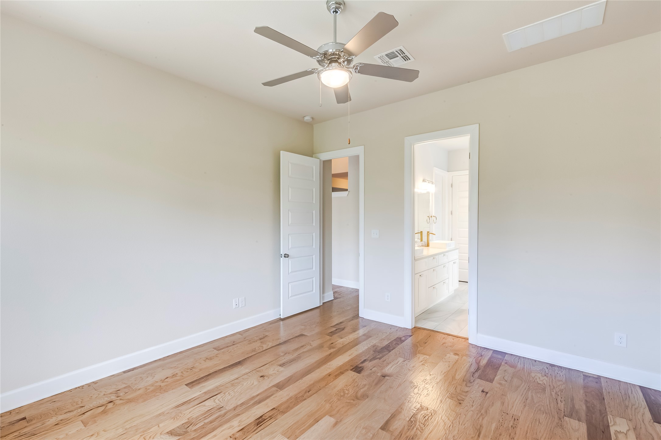 345 Fort Cobb Way Georgetown, TX 78628 - Photo 30 of 38 Gleaming hardwood floors and a smooth plaster finish define this serene private retreat.
