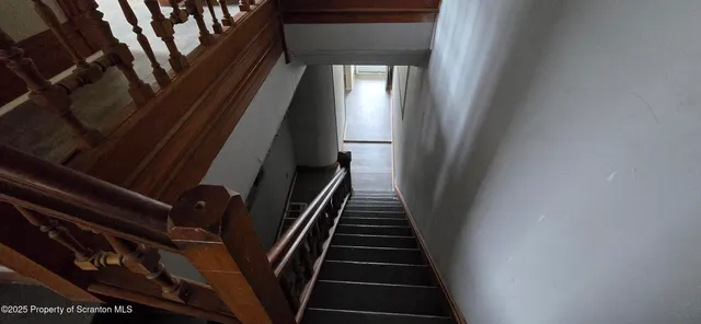 an empty room that has a window in it