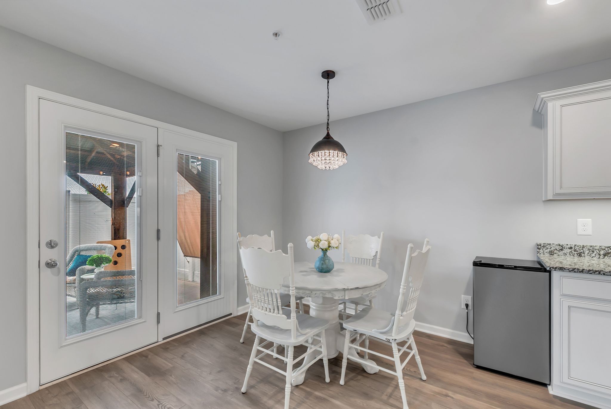 427 Tristan Way Spring Hill Spring Hill, TN 37174 - Photo 12 of 41 a view of a dining room with furniture and wooden floor