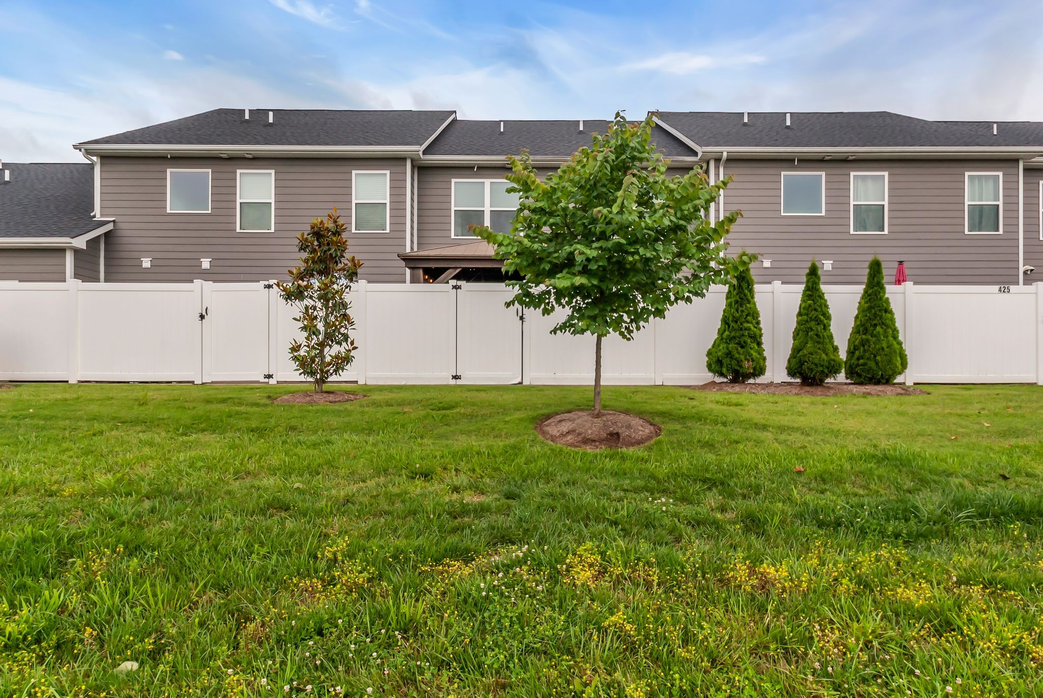 427 Tristan Way Spring Hill Spring Hill, TN 37174 - Photo 37 of 41 a front view of a house with a garden and plants