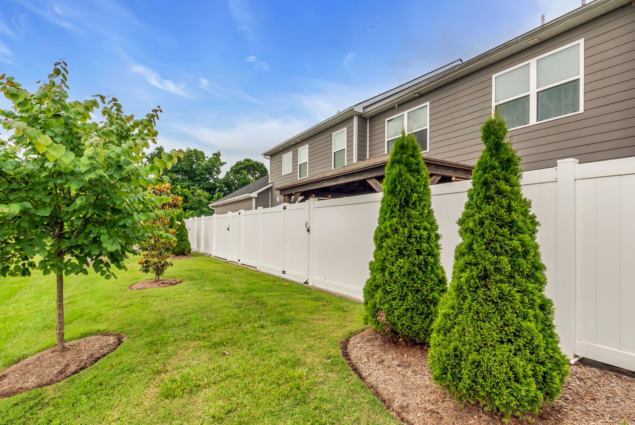427 Tristan Way Spring Hill Spring Hill, TN 37174 - Photo 38 of 41 a backyard of a house with plants and garden
