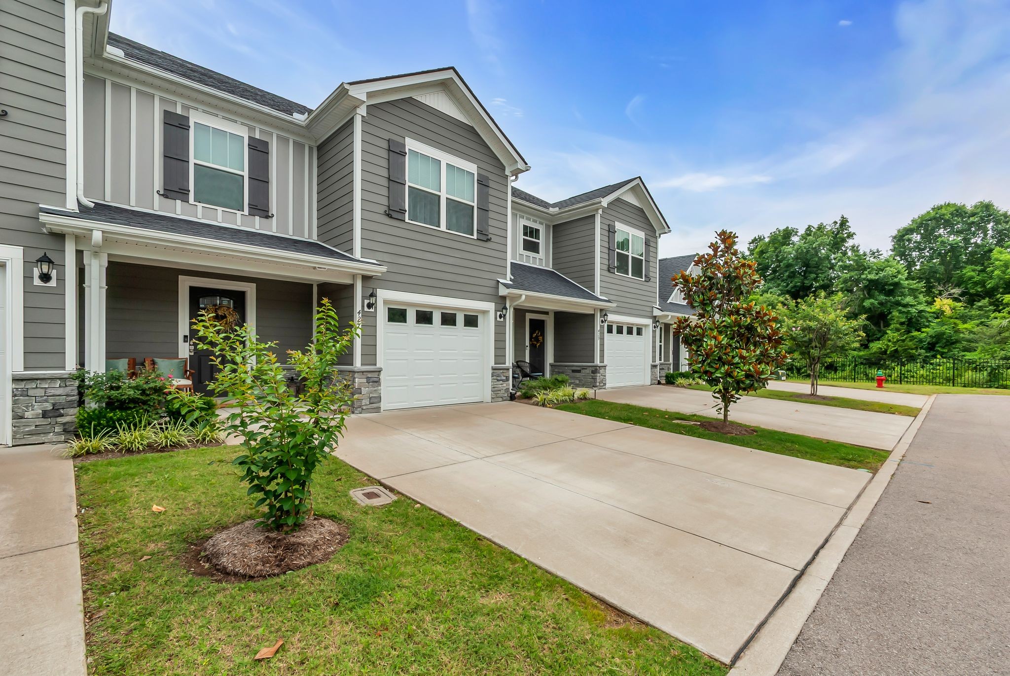 427 Tristan Way Spring Hill Spring Hill, TN 37174 - Photo 4 of 41 a front view of a house with a yard and garage