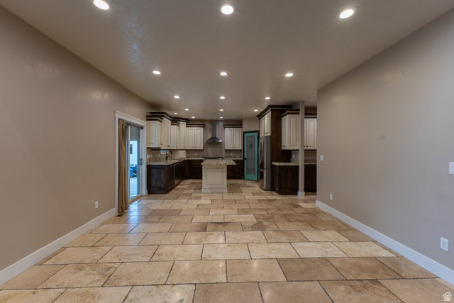 3565 West 1350th Street North Vernal, UT 84078 - Photo 9 of 54 Open-concept kitchen and dining area featuring large format tile flooring, recessed lighting, and a sliding glass door