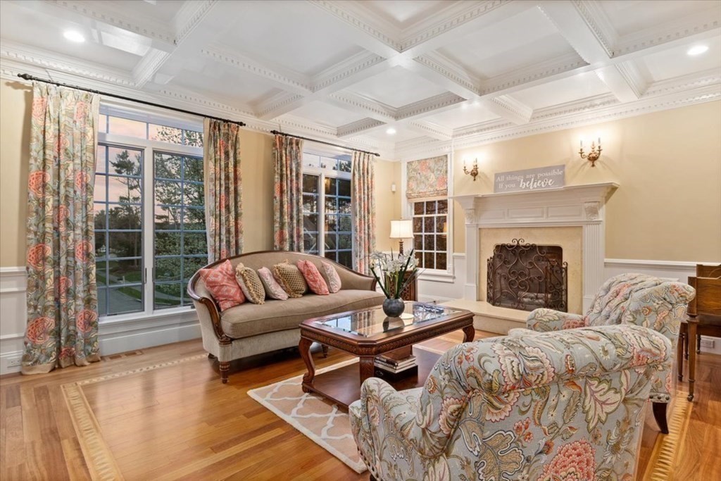 56 Mill Brook Avenue Walpole, MA 02081 - Photo 14 of 42 a living room with furniture and a fireplace