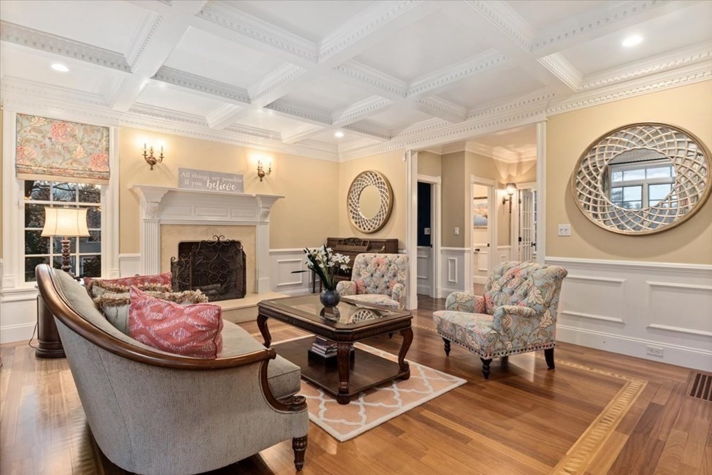 56 Mill Brook Avenue Walpole, MA 02081 - Photo 15 of 42 a living room with furniture and a fireplace