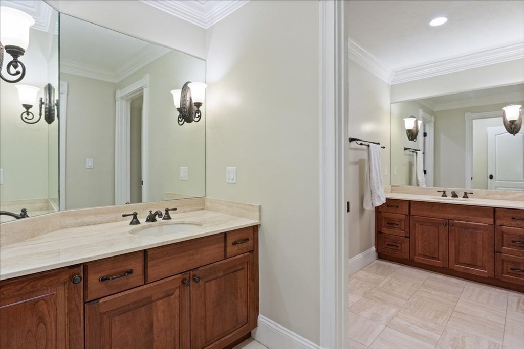 56 Mill Brook Avenue Walpole, MA 02081 - Photo 21 of 42 a bathroom with a granite countertop double vanity sink and a mirror
