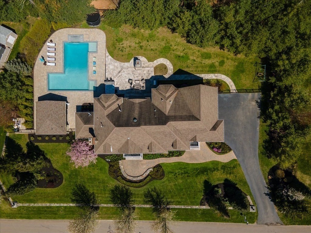 56 Mill Brook Avenue Walpole, MA 02081 - Photo 3 of 42 an aerial view of a house with garden space pool seating area and yard