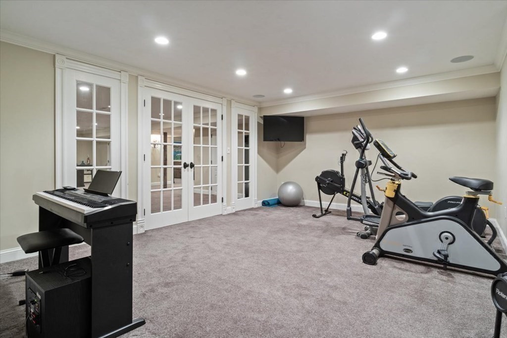 56 Mill Brook Avenue Walpole, MA 02081 - Photo 32 of 42 a view of a room with gym equipment