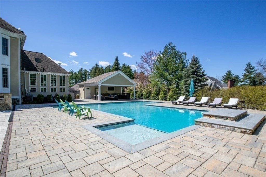 56 Mill Brook Avenue Walpole, MA 02081 - Photo 36 of 42 a view of house with outdoor seating space