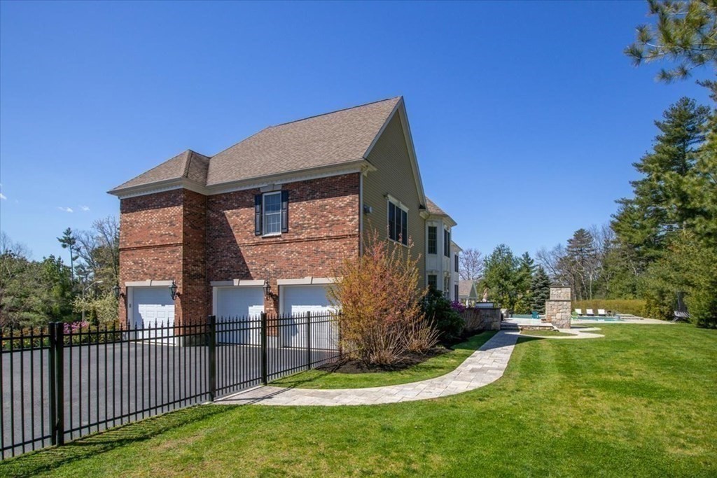 56 Mill Brook Avenue Walpole, MA 02081 - Photo 4 of 42 a view of a house with brick walls
