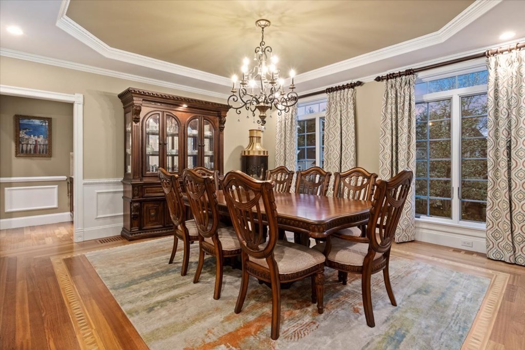 56 Mill Brook Avenue Walpole, MA 02081 - Photo 6 of 42 a view of a dining room with furniture window and wooden floor