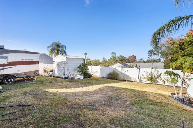 a view of a yard in front of a house