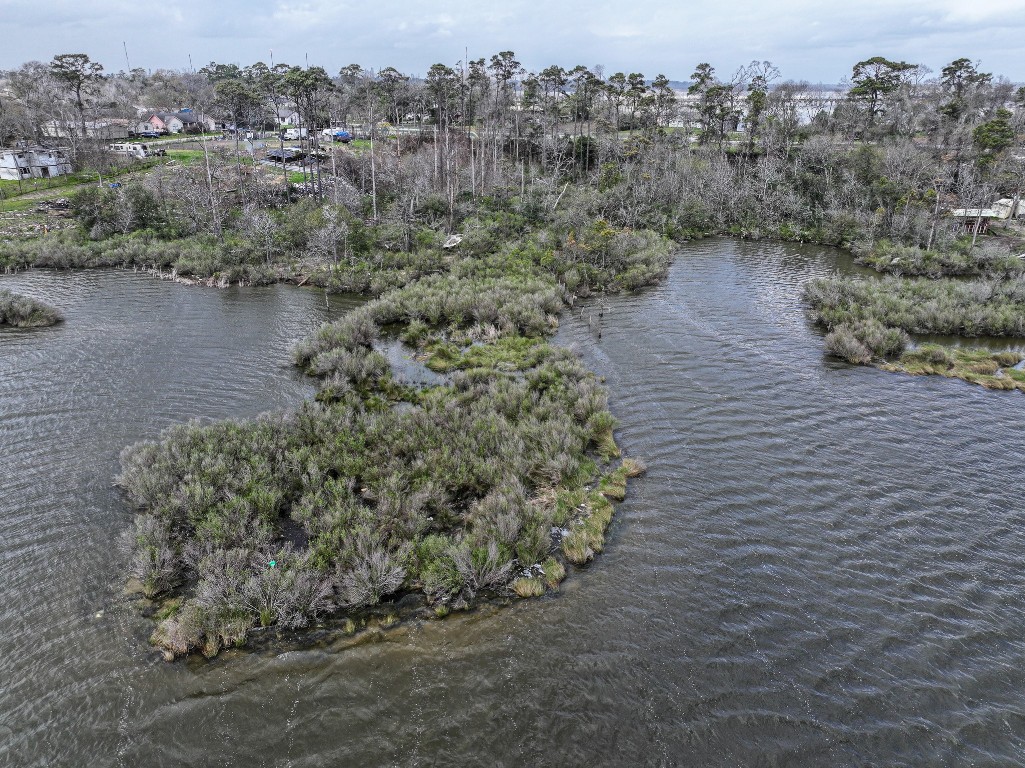 17202 Meadowbrook Drive Channelview, TX 77530 - Photo 14 of 22 a view of a lake with outdoor space