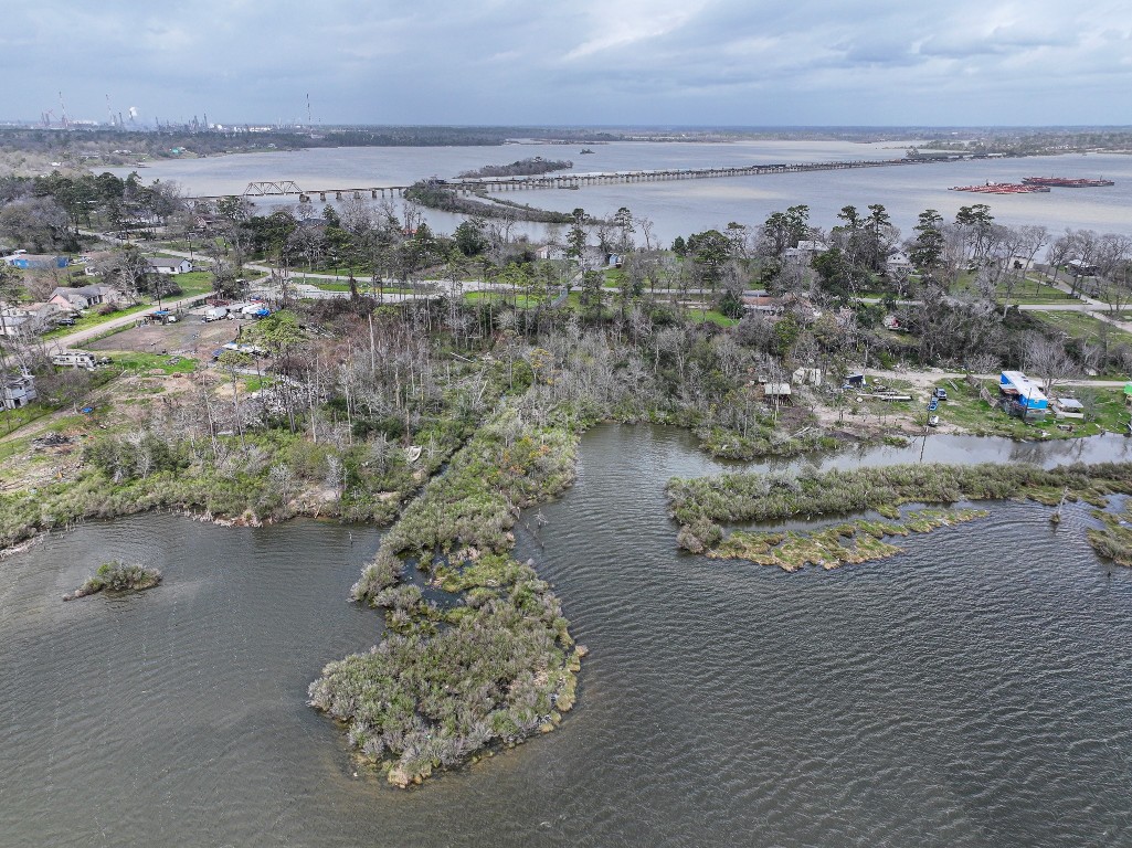 17202 Meadowbrook Drive Channelview, TX 77530 - Photo 3 of 22 an aerial view of a house with a lake view