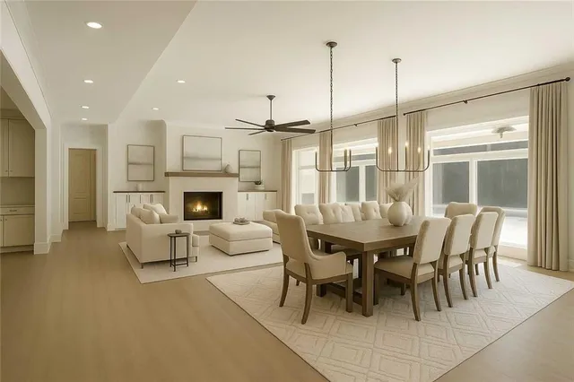 a view of a kitchen with a sink and a fireplace