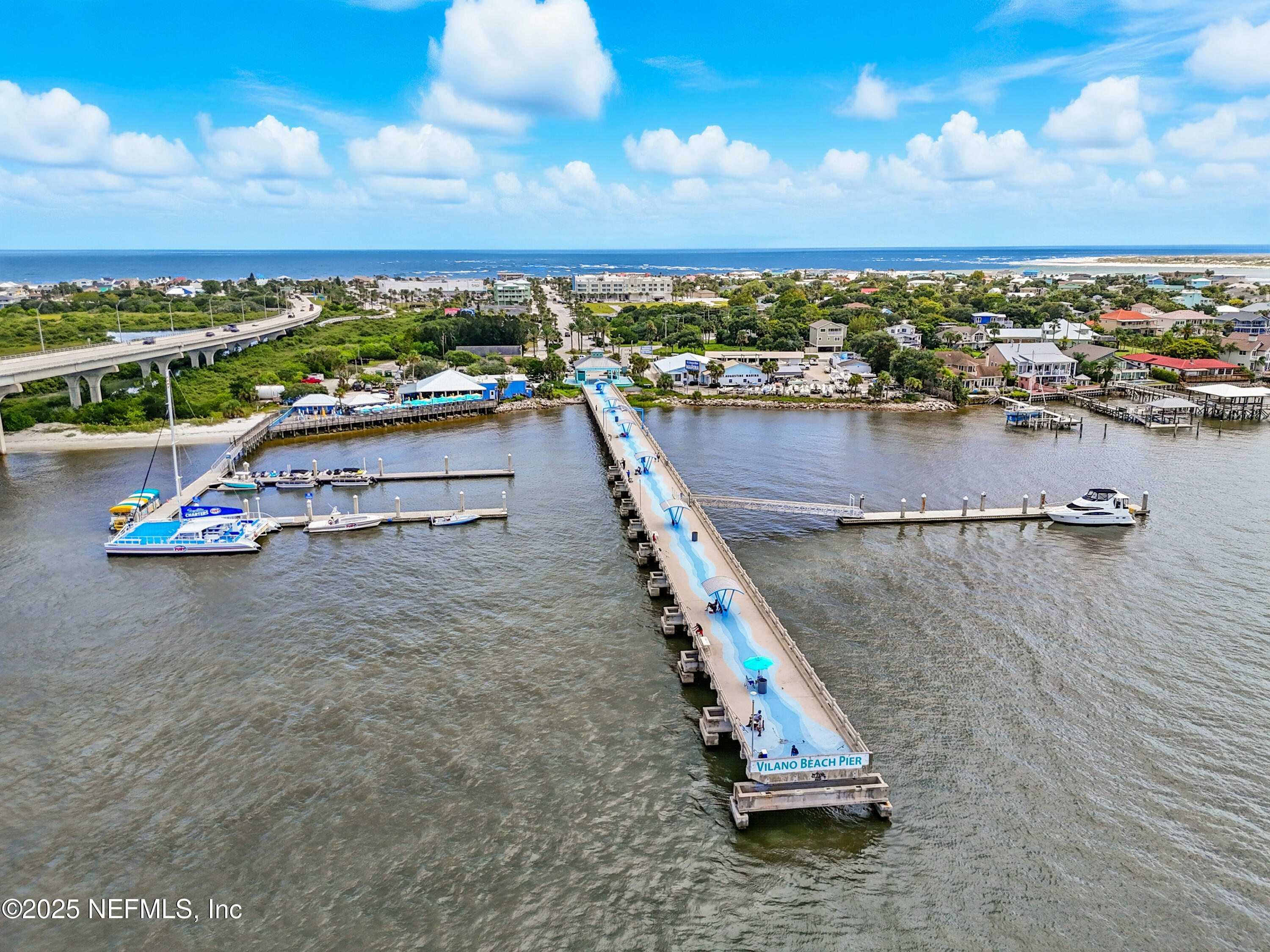 318 Genoa Road St. Augustine, FL 32084 - Photo 11 of 22 a view of a lake with a city