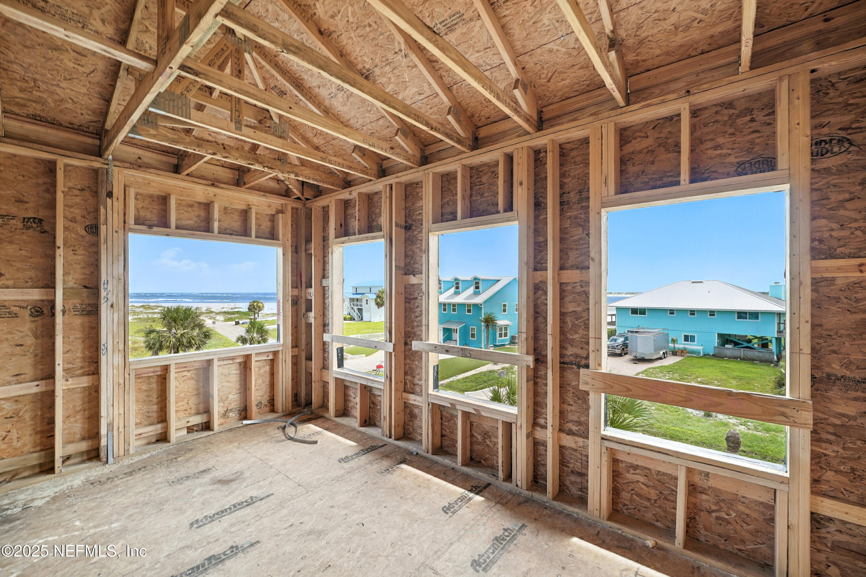 318 Genoa Road St. Augustine, FL 32084 - Photo 13 of 22 a view of an empty room with a window