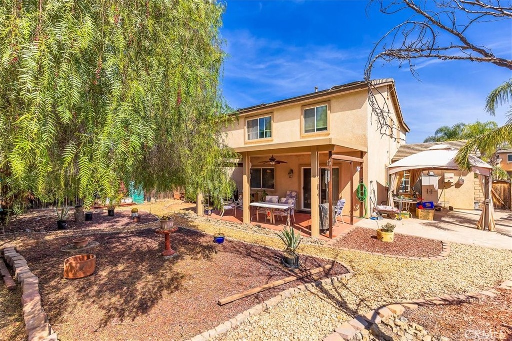 28984 Escalante Road Menifee, CA 92587 - Photo 27 of 40 Backyard with side yard view