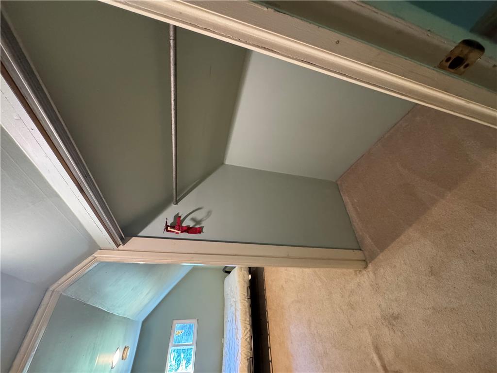 134 Bear Road Kunkletown, PA 18058 - Photo 41 of 42 A spacious closet is complete with wall-to-wall carpeting and sloped ceilings.