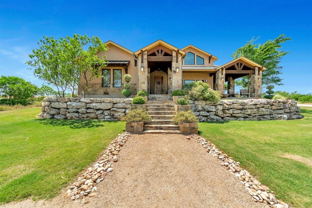 View of front of home with a front lawn