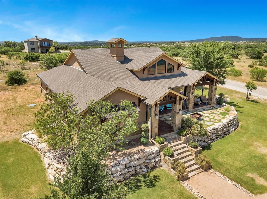 1231 Rawhide Ridge Graford, TX 76449 - Photo 2 of 26 View of front facade with a patio and a front yard