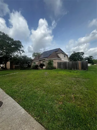 a house view with garden space