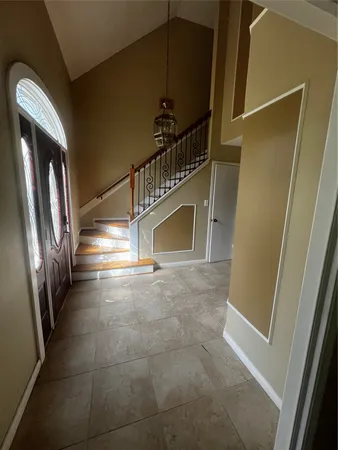 a view of a livingroom with wooden floor