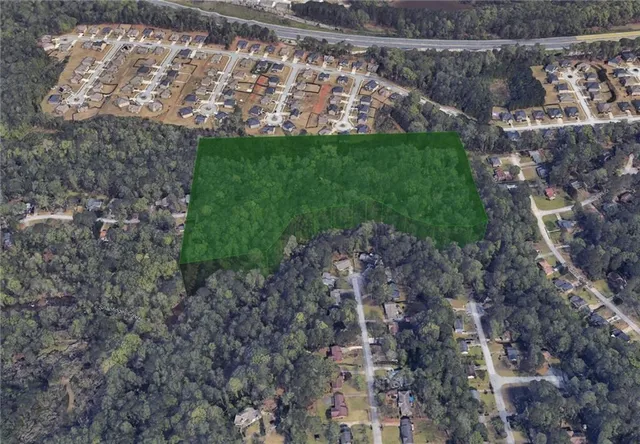 a view of a back yard of a house