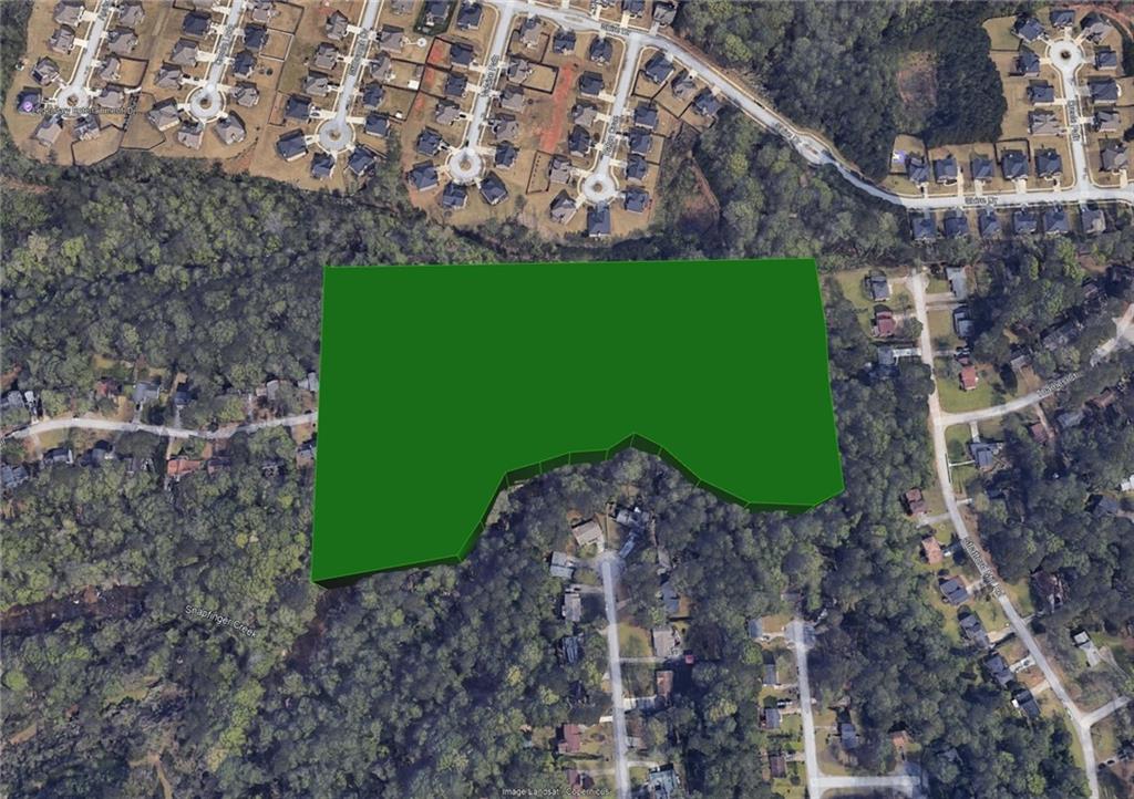 2957 Thompson Mill Road Decatur, GA 30034 - Photo 2 of 9 a view of a back yard of a house