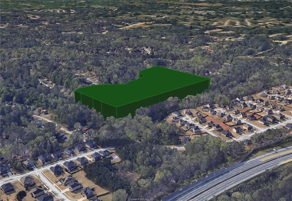 2957 Thompson Mill Road Decatur, GA 30034 - Photo 5 of 9 a view of a street with a yard