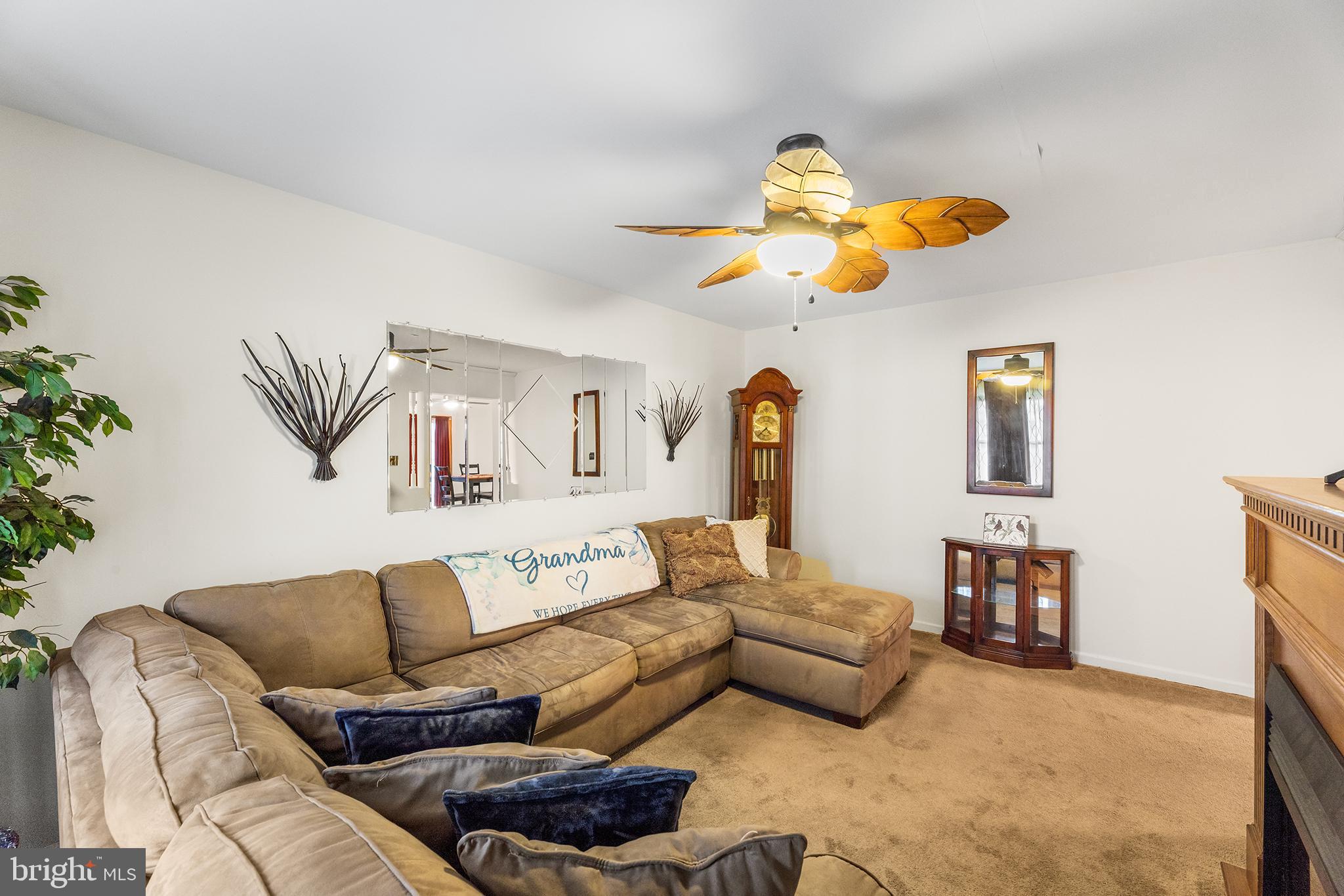 139 Prospect Street Chestertown, MD 21620 - Photo 5 of 28 a living room with furniture and a chandelier