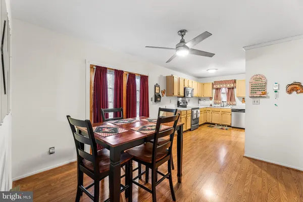 a kitchen with a sink stove and refrigerator